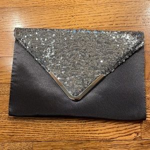 Gray clutch with silver sequins.